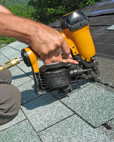 Roofer Installing Roof Shingles